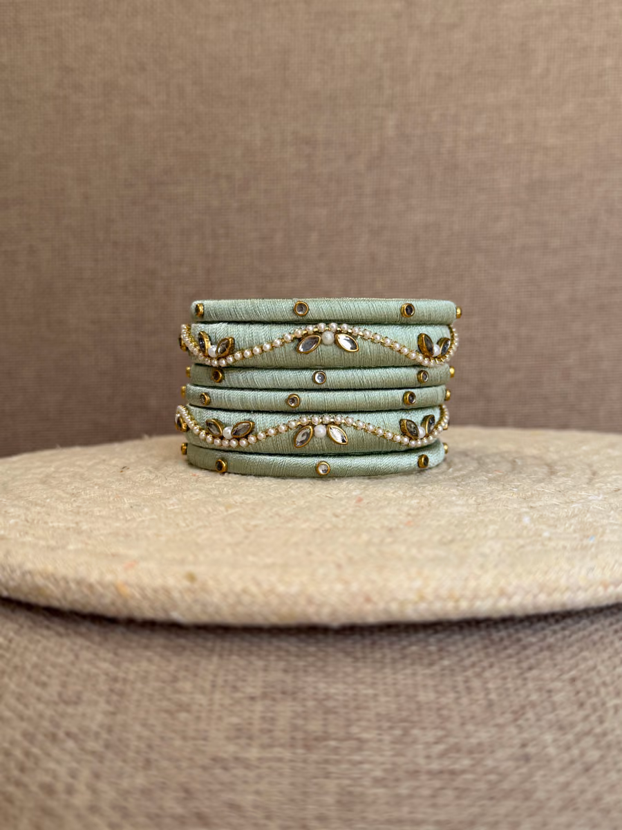 Vaidehi sage green handmade thread bangle set with pearl and kundan-style detailing by Kruki Dooki